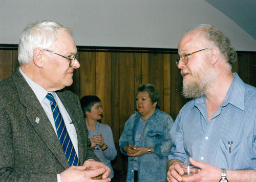 Prof Charlie Ellington talking to R E D Holder at a retirement party