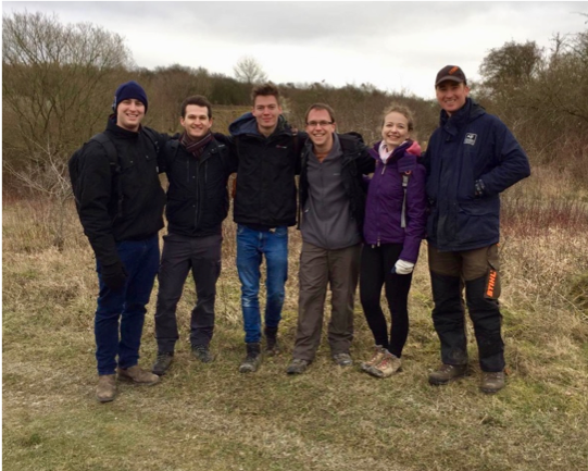 Figure 4: A photograph of the members of the Insect Ecology Group at the University of Cambridge working in grassland nature reserves. From left to right: Tate Lavitt (MPhil student), Matt Hayes (Research assistant), Matt Lewis (MPhil student), Andrew Bla