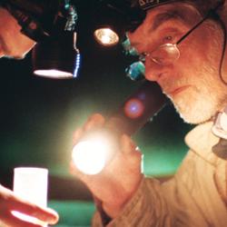 Roger Northfield and colleague checking a moth trap