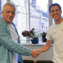 Dr William Foster and Prof Tim Weil shake hands during the Zoology Alumni and Friends Open Day